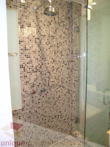 Furnished 1-bedroom condo with modern mosaic tile shower and glass enclosure. - 902 - 528 Beatty Street, Vancouver Downtown