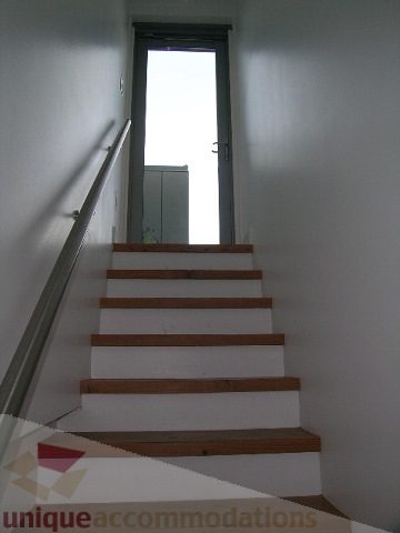 Bright and airy staircase leading to a well-lit upper level. - 902 - 528 Beatty Street, Vancouver Downtown