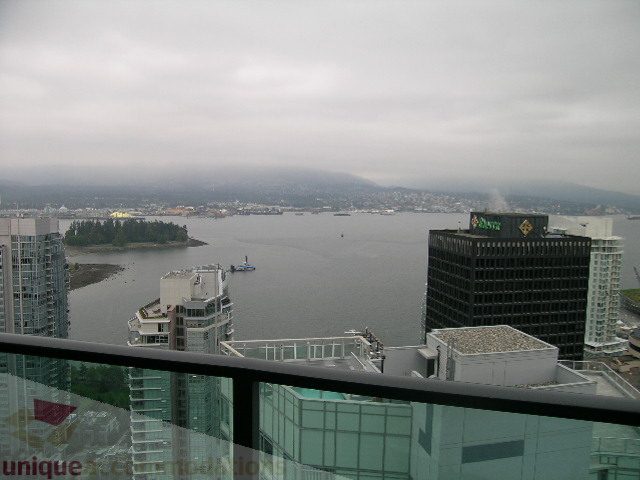 Bright balcony with city view and waterfront access. - 3802 - 1189 Melville Street, Vancouver Downtown