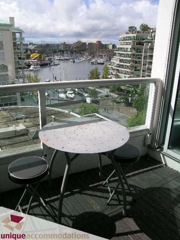 Furnished balcony with a view of the marina and downtown buildings. - 705 - 1500 Howe street, Vancouver Downtown