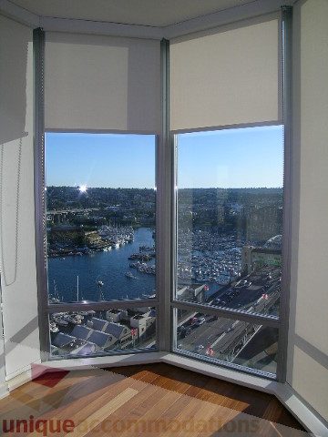 Bright living room with hardwood floors and stunning city view. - 2401 - 1005 Beach Avenue, Vancouver Downtown