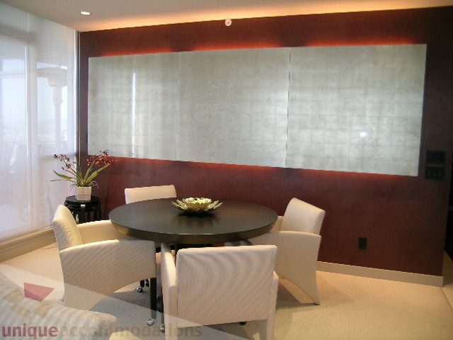 Furnished dining area with modern chairs and a sleek table, illuminated by recessed lighting. - 4303 - 1408 Strathmore Mews, Vancouver Downtown