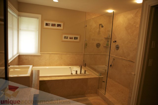 Spacious bathroom with marble countertops and a walk-in shower. - 3781 Bayridge Ave, West Vancouver