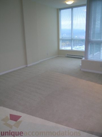 Bright living room with large windows and city view. - 3307 - 1328 West Pender, Vancouver Downtown