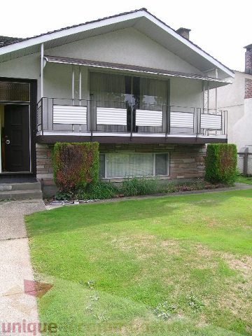 Furnished 6-bedroom + den house with a spacious balcony and lush green lawn. - 4408 Arbutus Street, Vancouver West Side