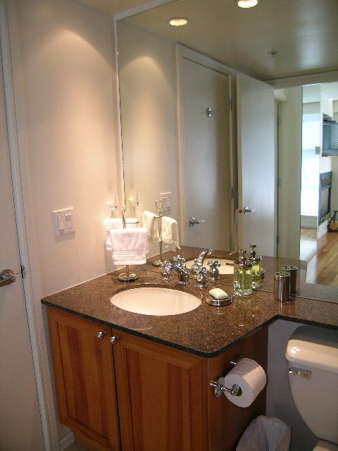 Bright bathroom with granite countertops and a city view. - 1102 - 1723 Alberni Street, Vancouver Downtown