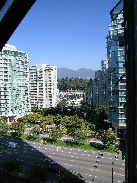 Bright living room with stunning city view and modern furnishings. - 1102 - 1723 Alberni Street, Vancouver Downtown