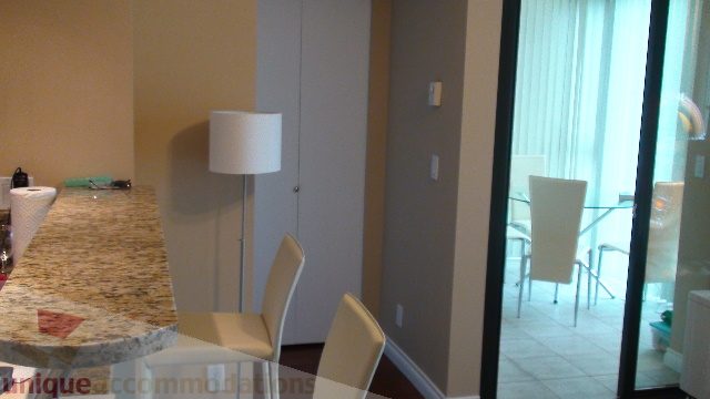 Spacious kitchen with granite countertops and a city view. - 1205 - 1331 West Georgia Street, Vancouver Downtown