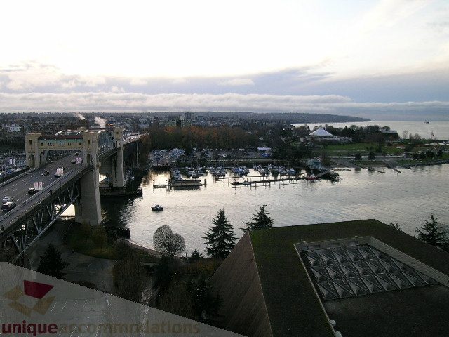 Bright living room with a stunning city view and waterfront access. - 1602 - 1005 Beach Ave., Vancouver Downtown