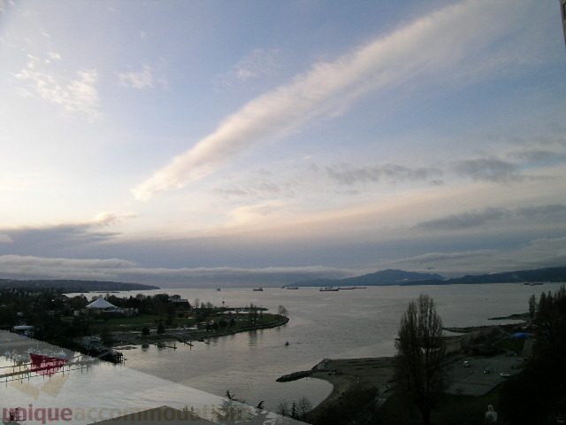 Bright living room with stunning city view and waterfront access. - 1602 - 1005 Beach Ave., Vancouver Downtown