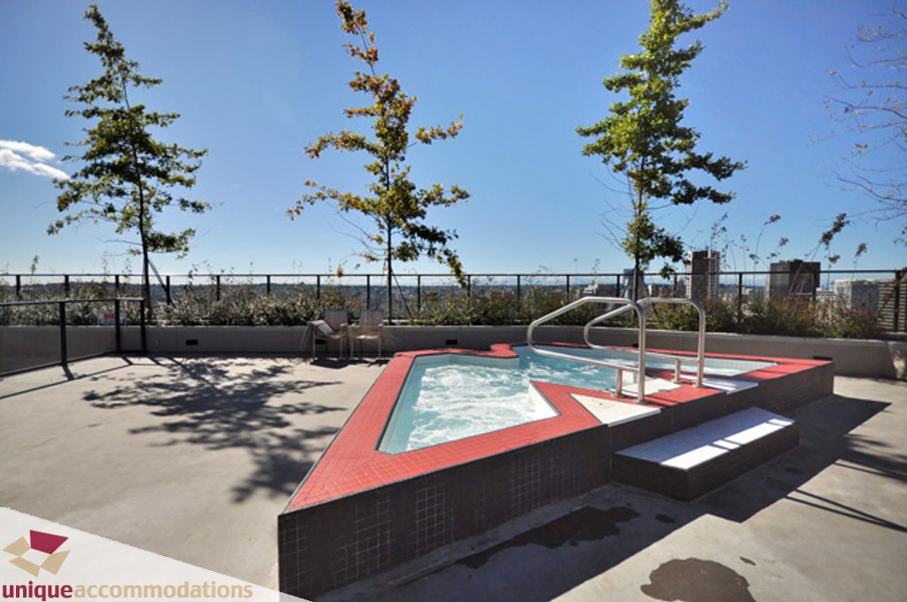 Spacious rooftop terrace with modern hot tub and city views. - 1409 - 108 West Cordova, Vancouver Downtown
