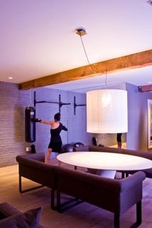 Furnished living room with exposed beams, modern lighting, and a pool table. - 20 - 133 Keefer Street, Vancouver Downtown