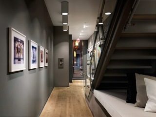 Loft with modern decor, open staircase, framed artwork, and exposed beams. - 30 - 133 Keefer Street, Vancouver Downtown