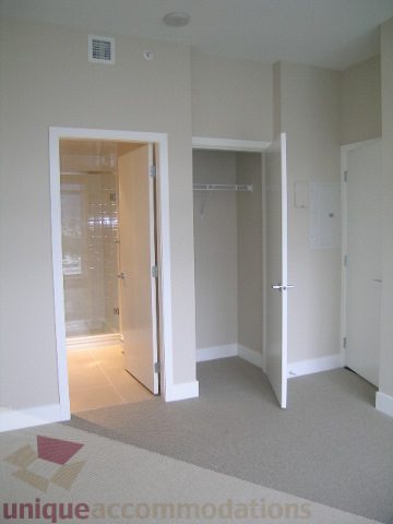 Spacious den with carpeted floor and closet access, perfect for relaxation or home office. - 1903 - 1320 Chesterfield Street, North Vancouver