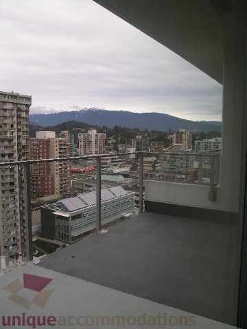 Spacious balcony with stunning city view and modern furnishings. - 1903 - 1320 Chesterfield Street, North Vancouver