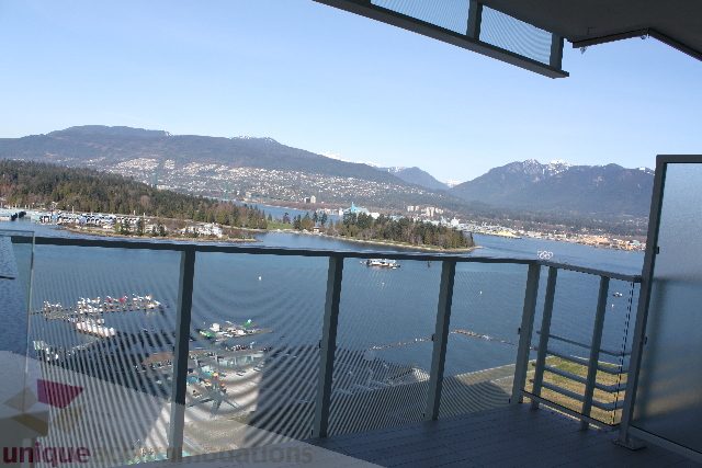 Furnished living room with a stunning city view and balcony access. - 2407 - 1011 West Cordova Street, Vancouver Downtown