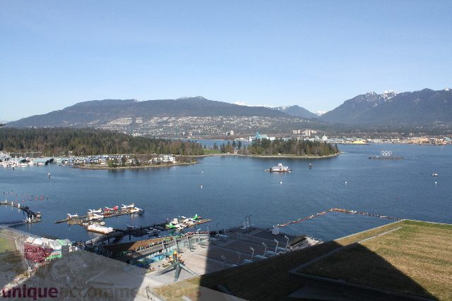 Bright living room with stunning city view and waterfront access. - 2407 - 1011 West Cordova Street, Vancouver Downtown