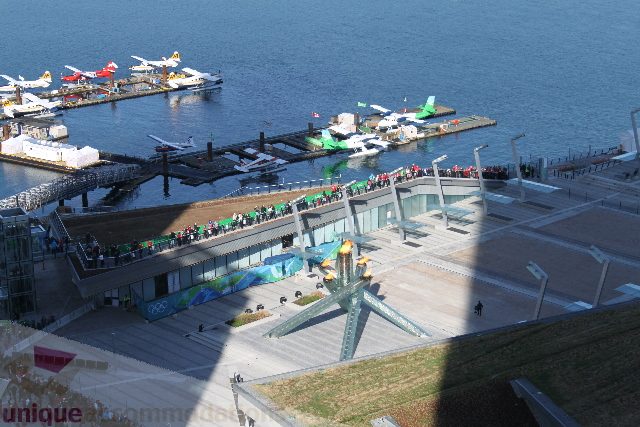 Spacious living room with a stunning city view and waterfront access. - 2407 - 1011 West Cordova Street, Vancouver Downtown