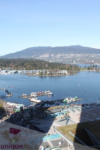 Bright living room with stunning city view and waterfront access. - 2407 - 1011 West Cordova Street, Vancouver Downtown