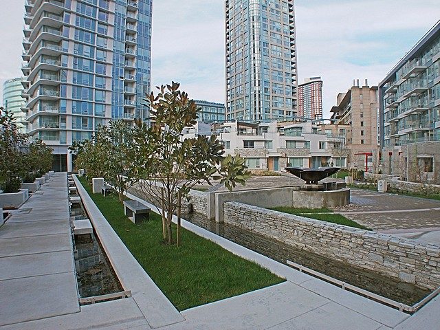 Furnished living room with modern furnishings and city view. - 3705 - 689 Abbott Street, Vancouver Downtown