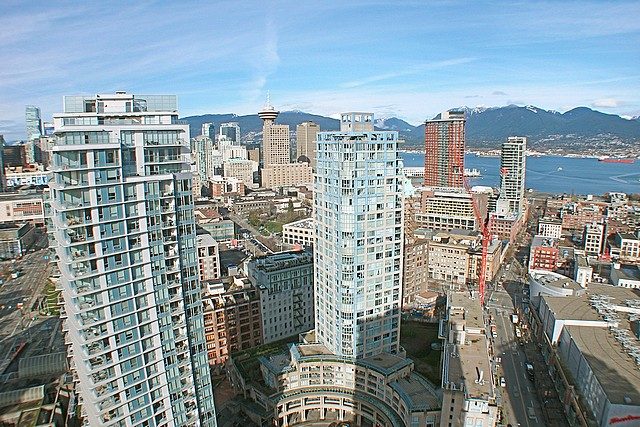 Bright living room with city view and modern furnishings. - 3705 - 689 Abbott Street, Vancouver Downtown