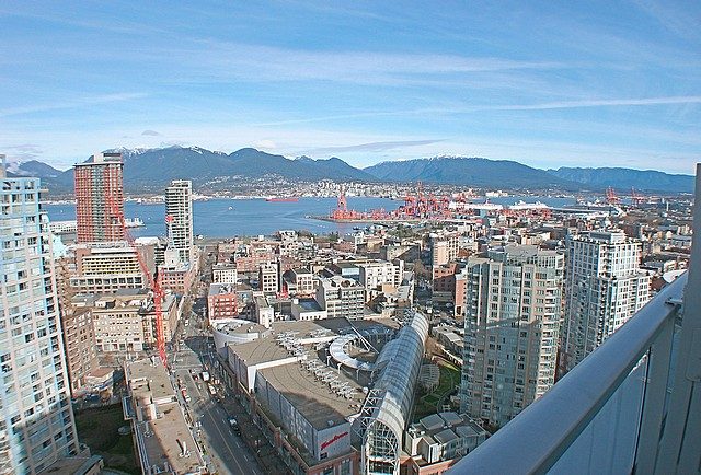 Bright living room with stunning city view and modern furnishings. - 3705 - 689 Abbott Street, Vancouver Downtown