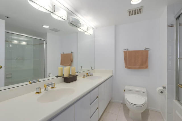 Bright bathroom with white countertops and a large mirror. - PH6  2806 - 950 Cambie Street, Vancouver Downtown
