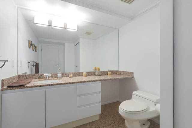 Bright bathroom with granite countertops and white cabinetry. - PH6  2806 - 950 Cambie Street, Vancouver Downtown
