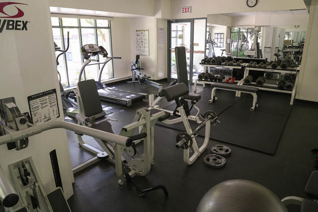 Bright and spacious gym with treadmills, weight machines, and mirrors. - PH6  2806 - 950 Cambie Street, Vancouver Downtown
