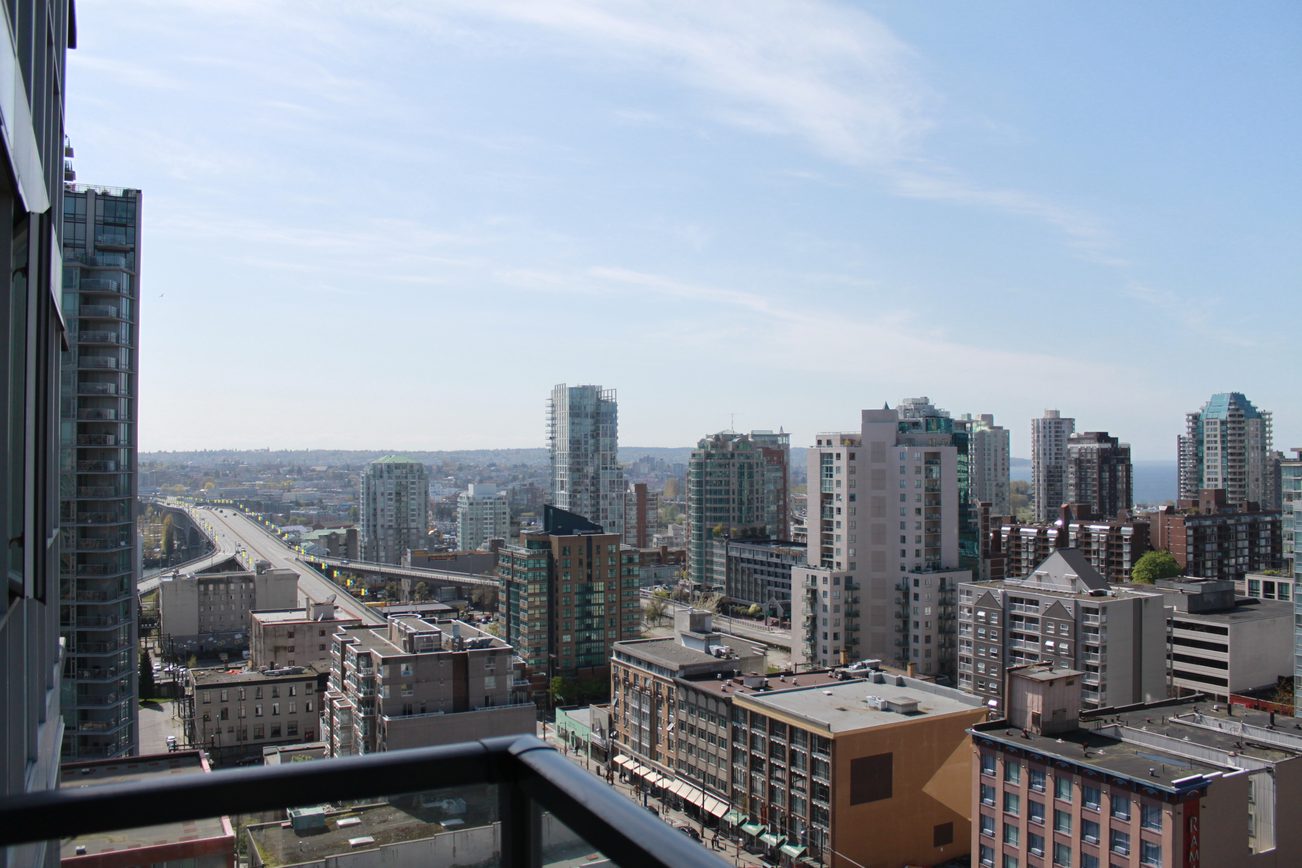 Bright living room with stunning city view and modern furnishings. - 2001 - 1199 Seymour, Vancouver Downtown