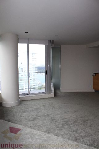 Spacious living room with city view and modern furnishings. - 2205 - 1077 West Cordova, Vancouver Downtown