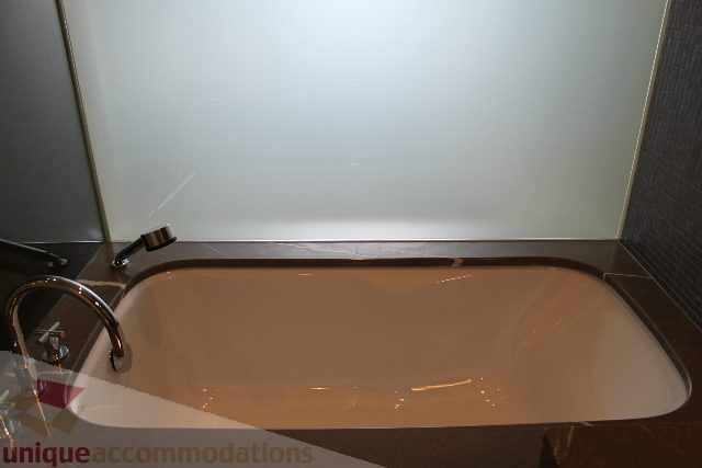Modern bathroom with sleek countertop and stylish faucet. - 2205 - 1077 West Cordova, Vancouver Downtown