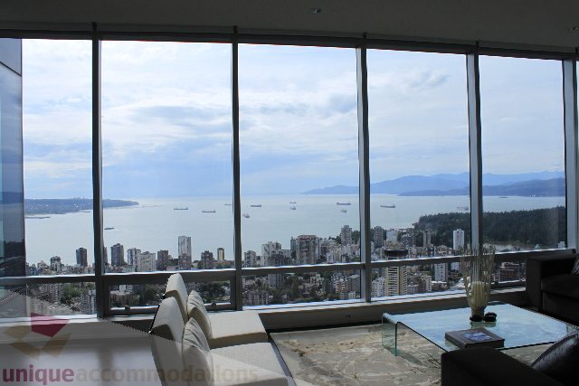 Bright living room with panoramic city view and modern furnishings. - 6002 - 1128 West Georgia, Vancouver Downtown