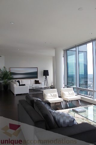 Spacious living room with city view and modern furnishings. - 6002 - 1128 West Georgia, Vancouver Downtown