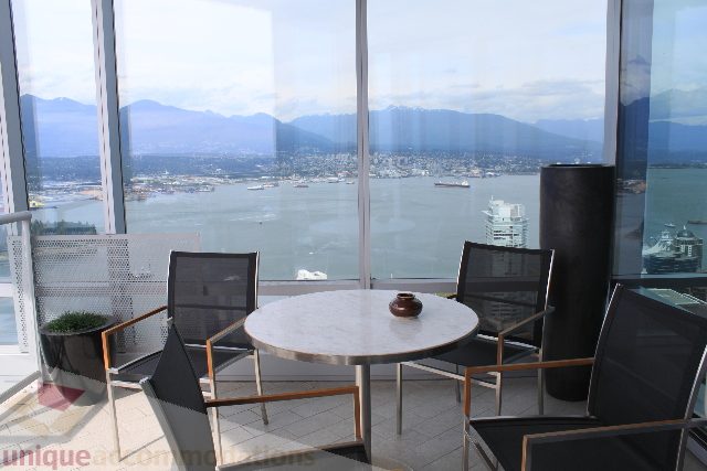 Furnished living room with city view and modern decor. - 6002 - 1128 West Georgia, Vancouver Downtown