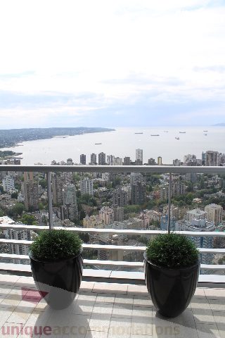 Bright balcony with city view and potted plants. - 6002 - 1128 West Georgia, Vancouver Downtown