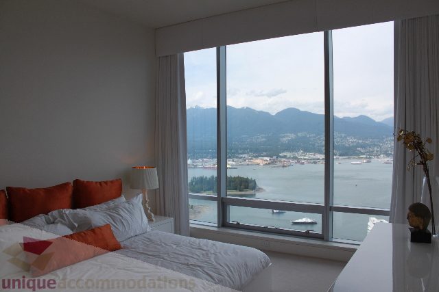 Furnished 2-bedroom condo with a stunning city view and modern decor. - 6002 - 1128 West Georgia, Vancouver Downtown