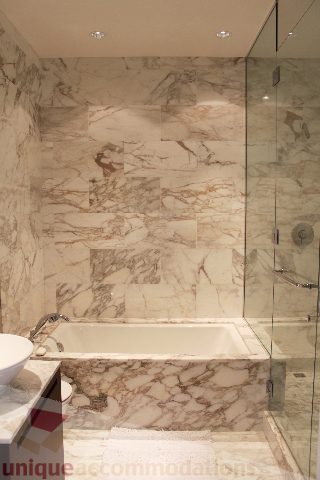 Spacious bathroom with marble tiles and glass shower. - 6002 - 1128 West Georgia, Vancouver Downtown