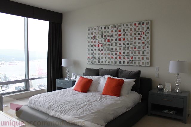 Spacious 2-bedroom condo with modern decor, city view, and large windows. - 6002 - 1128 West Georgia, Vancouver Downtown