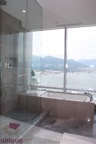 Luxurious bathroom with a stunning city view and modern fixtures. - 6002 - 1128 West Georgia, Vancouver Downtown