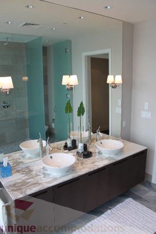 Bathroom with marble countertop and modern sink fixtures. - 6002 - 1128 West Georgia, Vancouver Downtown