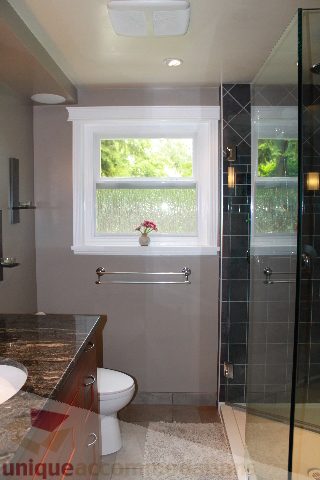 Bathroom with modern fixtures, glass shower, and granite countertop. - 2730 Ailsa Crescent, North Vancouver