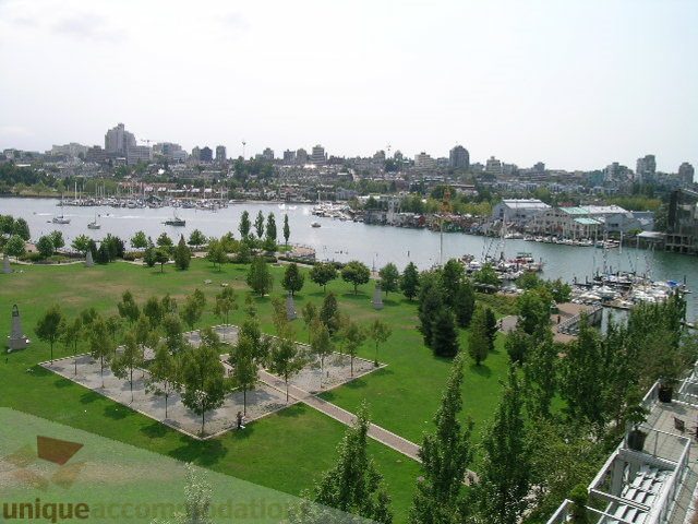 Furnished living room with city view and waterfront access. - 707 - 638 Beach Crescent, Vancouver Downtown