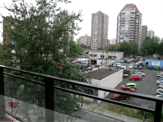 Bright balcony with city view and parking lot below. - 406 - 1252 Hornby Street, Vancouver Downtown