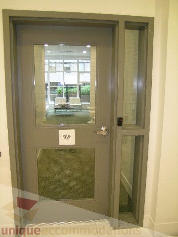 Furnished entry door with glass panels and a view of the interior. - 406 - 1252 Hornby Street, Vancouver Downtown