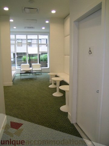 Bright living room with modern furniture and city view. - 406 - 1252 Hornby Street, Vancouver Downtown