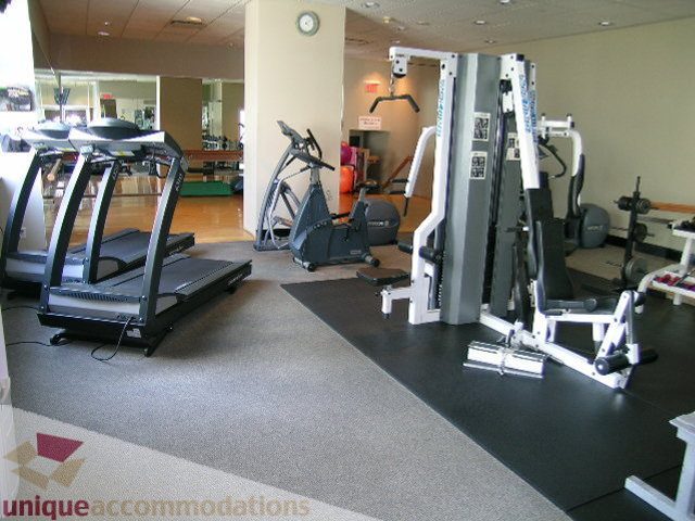 Fitness room with treadmills, weight machines, and cardio equipment. - 1602 - 560 Cardero, Vancouver Downtown