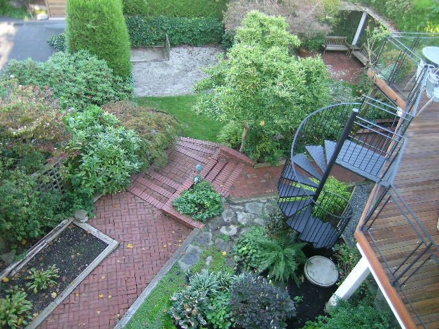 Stunning 6-bedroom house with a spiral staircase and lush garden. - 4663 Bellevue Drive, Vancouver West Side