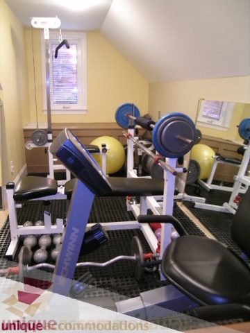Bright gym with weightlifting equipment and exercise balls. - 3030 West 15th Avenue, Vancouver West Side