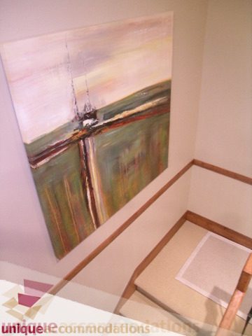 Staircase leading to second floor with abstract art on wall. - 3030 West 15th Avenue, Vancouver West Side